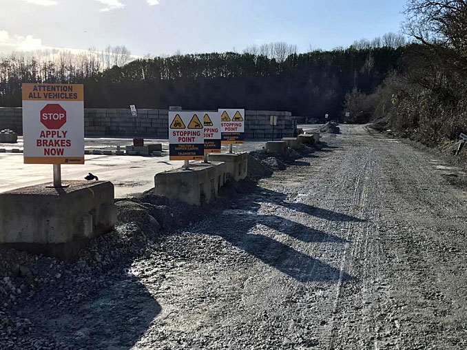 Brake check area with signage for testing